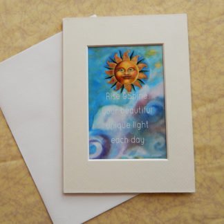 Danasimson.com Matted art card with envelope, "Rise and shine your beautiful unique light each day" quote, sun face image.