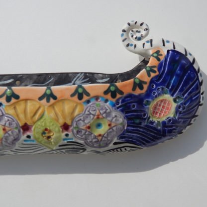 Danasimson.com Ceramic wall sculpture; canoe detail