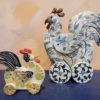 Danasimson.com Roosters on wheels sculptures.