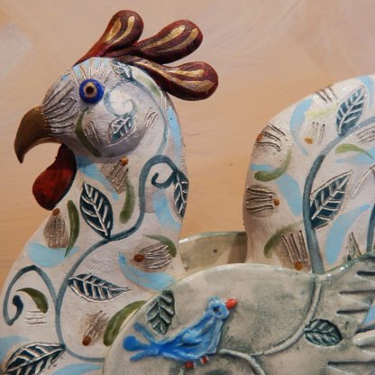 Danasimson.com rolling rooster sculpture face detail