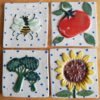 kitchen garden tiles Danasimson.com Custom ceramic tiles for kitchen; broccoli, sunflower, tomato and bee.