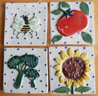 kitchen garden tiles Danasimson.com Custom ceramic tiles for kitchen; broccoli, sunflower, tomato and bee.