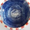 Danasimson.com Blue Crab coffee scoop inside scoop is a raised crab image. blue background red checks around the rim.
