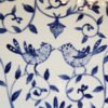 Danasimson.com Delft Blue birds "Happy.nest" Platter closeup of two birds brush work.