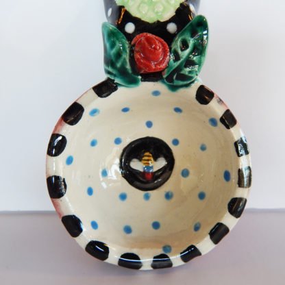 Danasimson.com Our handmade bee and rose handle Coffee Scoop is about 7 inches by 3,” in colorful ceramic. Detail of the bowl with little bee.