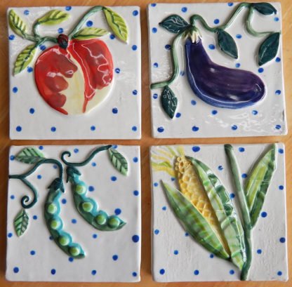 kitchen garden tiles Danasimson.com Custom ceramic tiles for kitchen; peach, eggplant, corn, snap peas.