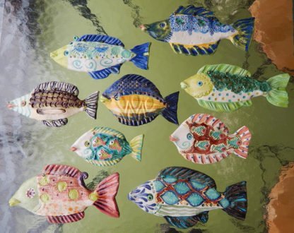 Danasimson.com Wall sculpture, hanging fish one of a kind, all colors with raised patterns in handmade ceramic.