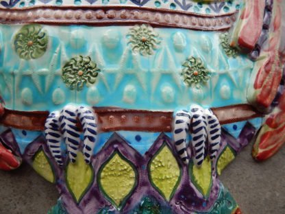 Danasimson.com Owl wall sculpture detail of chest and claws. Relief ceramic in colorful glazes.