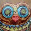 Danasimson.com Owl wall sculpture detail of head eyes and beak. Relief ceramic in colorful glazes.