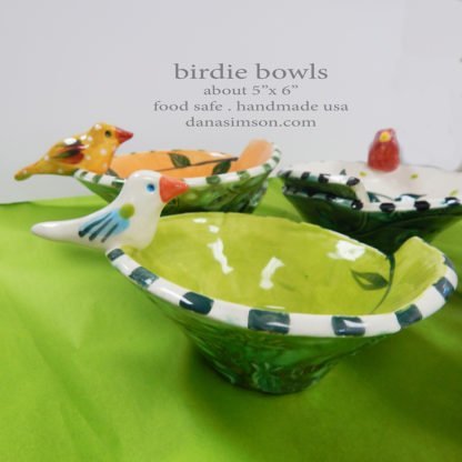 Danasimson.com Handmade ceramic bird bowls in bright jewel tone colors.