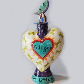 Danasimson.com Custom Pet Urn in the shape of a heart, with a moon stopper.