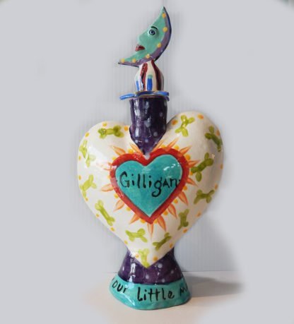 Danasimson.com Custom Pet Urn in the shape of a heart, with a moon stopper.