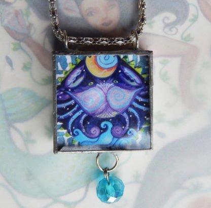 danasimson.com Handcrafted double sided beveled glass pendents with bead detail. Crab image.