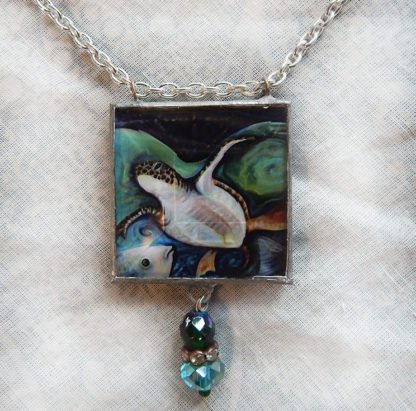 Danasimson.com Sea Turtle Necklace two sided pendent-handmade with beveled glass and beads added.