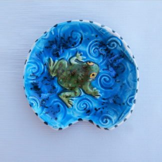Danasimson.com Handmade ceramic frog spoon rest with colorful raised details.
