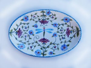 Danasimson.com Oval dragonfly platter. purple and blue flowers with a dragonfly centered. Colorful hand painted floral design.