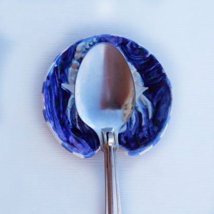 Danasimson.com Big serving spoon on handmade ceramic spoon rest