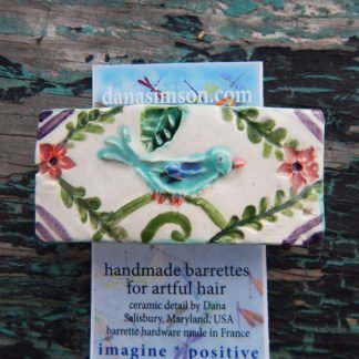 blue bird barrette shown on tag