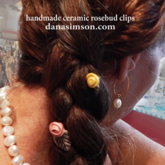 rosebud clips inserted into braid