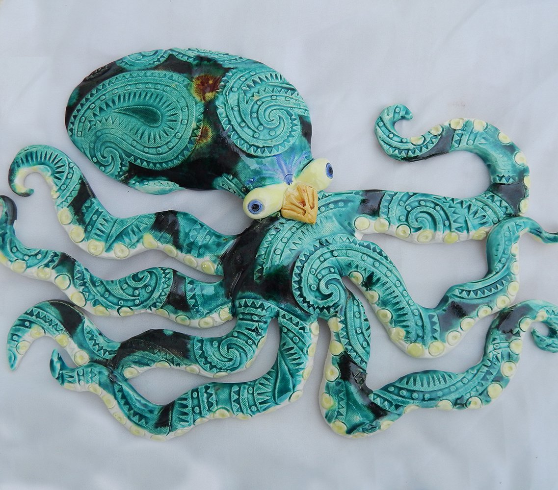 octopus in green and teal wall sculpture