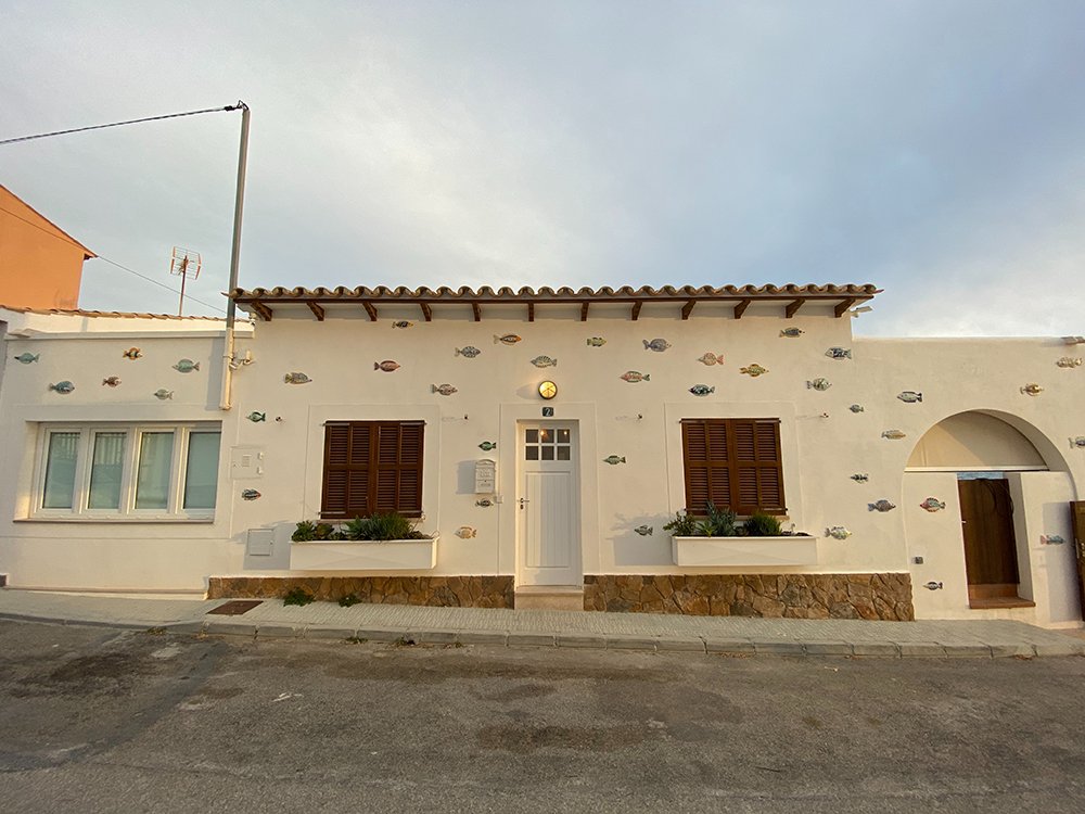 handmade ceramic sea creatures and fish on the Villa's exterior