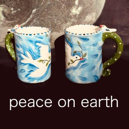two mugs with peace dove